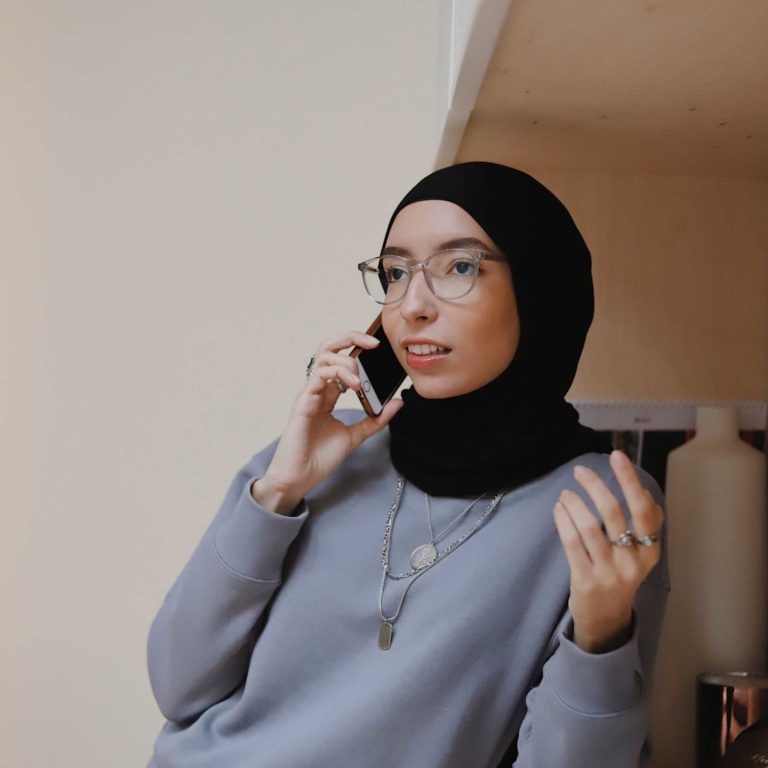 New resident to Canada talking on phone