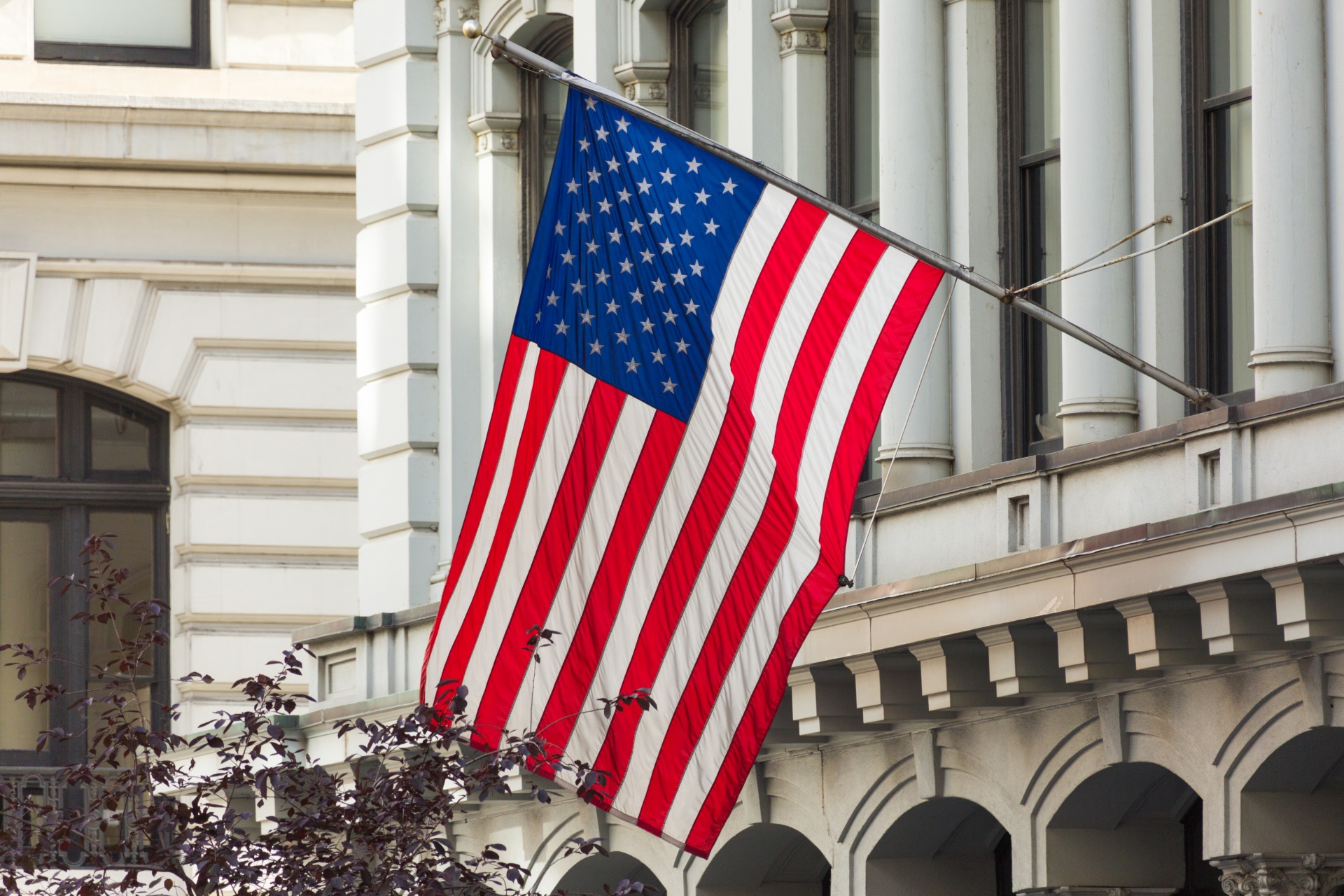 american flag over building